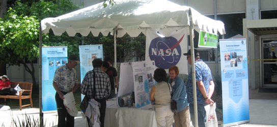 Open House Visitors: Jet Propulsion Laboratory Open House guests visit the NASA groundwater cleanup booth. Extensive information on the cleanup project is available to the public by contacting Merrilee Fellows, NASA Manager for Community Involvement, by email at mfellows@nasa.gov, by postal mail at the NASA Management Office, 4800 Oak Grove Drive, Pasadena, California 91109, or by telephone at (818) 393-0754.